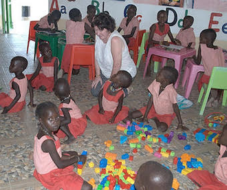 Getting down with the kids, New Ways CEO Angela Docherty at Todonyang Nursery School