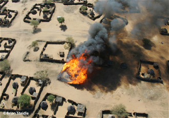 Image by Brian Steidel shows 2004  attack on Darfur village Um Zeifa