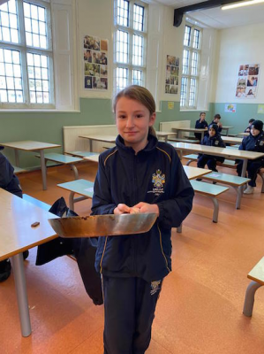 Annie flipping a pancake