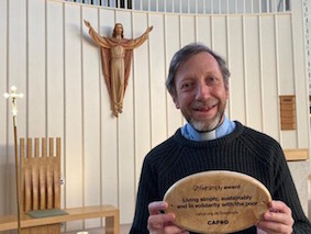 Father Rob Esdaile with Live Simply Award