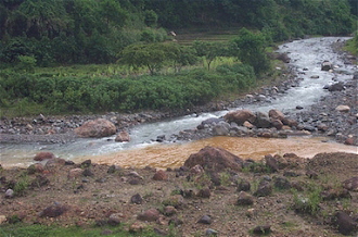 Caustic mining waste pours into Mamkayan Creek image: Columbans