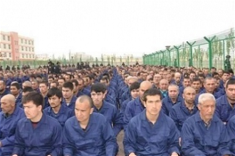 Uighar prisoners in Xinjiang Re-education Camp Lop County 2018 - Wiki image