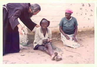 John Bradburne with residents at Mutemwa - image with kind permission of JBMS