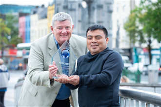 Broadcaster John Creedon presents Abelino Chub Caal with Trócaire's Romero International Award in Cork City. Photo: Gerard McCarthy/Trócaire.