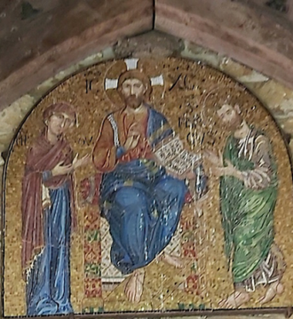 Mosaic and Swallow Nest  above Rousham church door  Oxfordshire