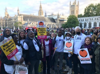 Group from Jesuit Refugee Services outside Parliament with director Sarah Teather on right