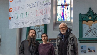 Fr Philippe (right) with Ludovic and  Anaïs
