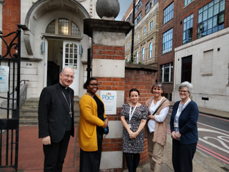 Bishop Richard Moth (left) with Faith in Action team Jamila, Emma, Theresa and Marie