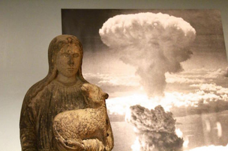 Statue of St Agnes from ruins of Nagasaki Catholic Cathedral after the bomb - now on display in the UN Headquarters. Photo: Marcelo Schneider/WCC