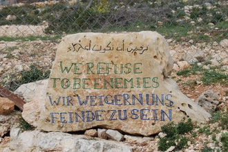 Inscription reads: WE REFUSE TO BE ENEMIES  - Photo: Emma Halgren/WCC