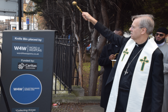 Bishop Hudson blesses bin