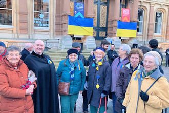 Fr Spellman with parishioners from St Mary's, St Pancras and St Mark's at vigil. Image Keith Morris