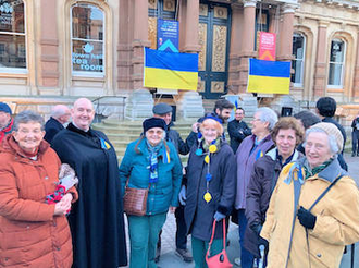 Fr Spellman with parishioners from St Mary's, St Pancras and St Mark's at vigil. Image Keith Morris