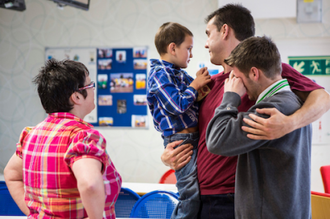 Prisoner's family on a visit. The children haven't seen Dad for 5 months. Image: Andy Aitchison.