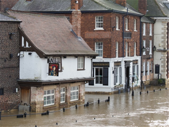 Heavy floods drench historic houses in York 2020 - Photo by Don Lodge on Unsplash