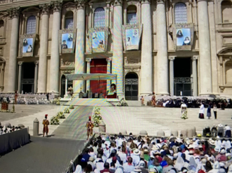 Banners on St Peter's depict the new Saints