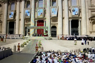 Banners on St Peter's depict the new Saints