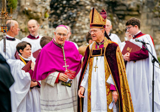 Bishop Alan Hopes with Bishop Martin Seeleyin ruins of St Edmunds Abbey. Picture by Tom Soper.