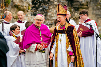Bishop Alan Hopes with Bishop Martin Seeleyin ruins of St Edmunds Abbey. Picture by Tom Soper.