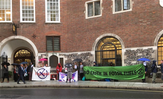 After the Shell AGM action campaigners joined Operation Noah for prayers outside CoE offices