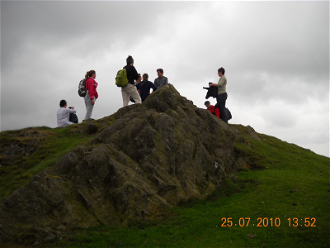Past participants in Thinking Faith on top of a mountain in the Lake District