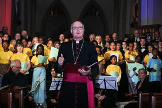 Bishop Patrick McKinney welcomes the crowds