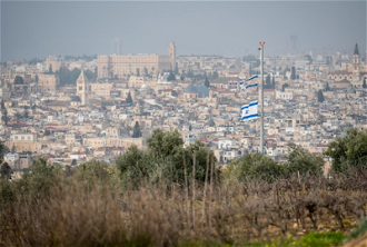 Israeli flags flying at new illegal Beit Ottorot settlement on Mount of Olives, Jerusalem.....  Photo: Albin Hillert/WCC