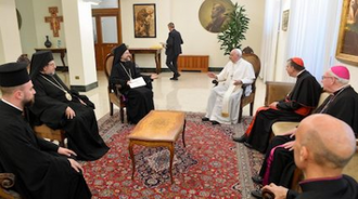 Pope with ecumenical delegation. Vatican Media