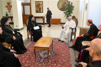 Pope with ecumenical delegation. Vatican Media