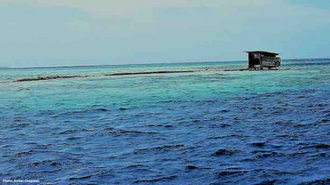 A disappearing atoll between the island of Taha'a and Rai'atea, Leeward Islands, French Polynesia. Photo Arthur Chapman