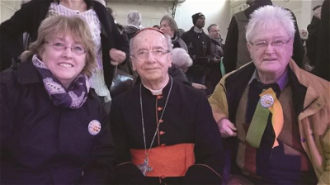 Cardinal Hummes  with Ellen Teague and Fr Charles Rue at 2015 Paris Climate Talks