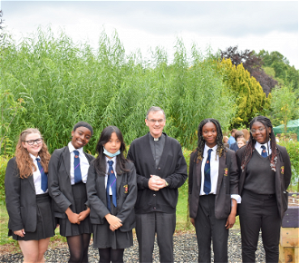 Bishop John with students from Our Lady's RC High School, Manchester