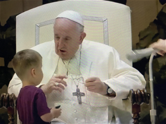 Pope chats with small boy during today's General  Audience. ICN/Screenshot
