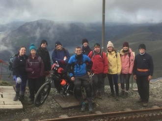 Our team at the windswept summit.