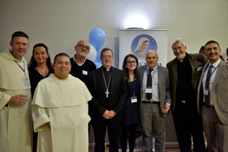 l-r: Fr Toby Lees, Katie Smith, Fr Lawrence Lew, Michele Cucchi, Bishop John Sherrington, Izzy Rettke-Grover, Vittorio Viccardi, President, Fr Andreas Schaetzle, Raffaele Galati