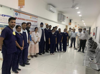 Simran with hospital staff (St Augustine's Priory)