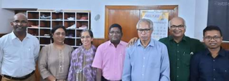 Father Pushpa Anbu and colleagues at the Islamic Studies Association, Delhi