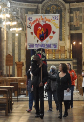 The celebration began with a procession of banners.