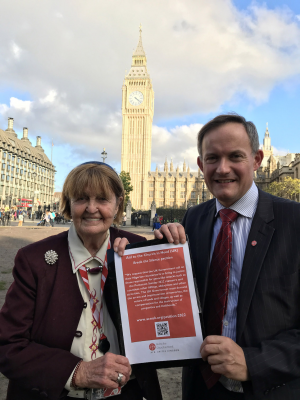 Baroness Caroline Cox and John Pontifex with the petition © ACN