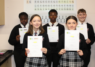 Young scientists with their awards