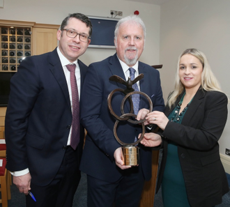 Ronan Scully (centre) with Senator Rónán Mullen and Carol Nolan TD