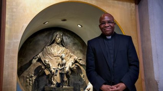 Canon Victor Darlington,  at Migrants Shrine in Saint Georges Cathedral