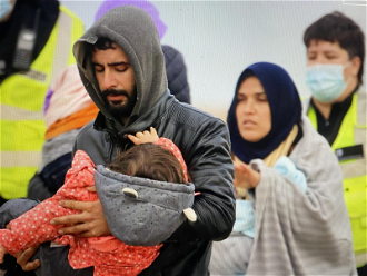 Refugee family arriving in UK. Image: Care4Calais