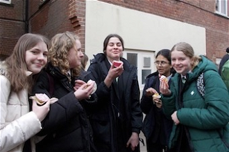 Students enjoy cakes from fundraising drive
