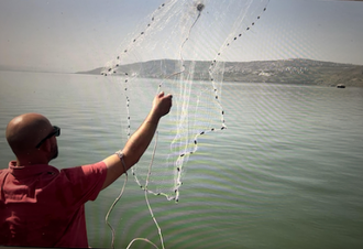 Casting a net on the Sea of Galilee