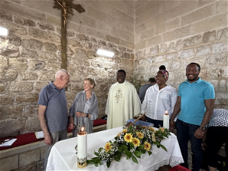 Colin and Fleur, Ese and Obi with Fr Charles in Cana - where they renewed their marriage vows.