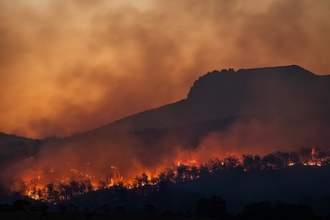 Bushfires below Stacks Bluff, Tasmania, Australia.  Photo by Matt Palmer on Unsplash