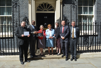 l-r: Fr Dominic Robinson, Fr Matthew Madewa, Fiona Bruce MP, Baroness Caroline Cox, ACN Director Caroline Hull, John Pontifex,  Mike Watts