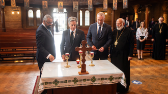 l-r: James Cleverley, Anthony Blinken, Oleksandr Bankov and Bishop Nowakowski