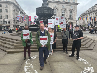 Campaigners at Piccadilly Circus  on the way to Indian High Commission - Image: Winsum Oo